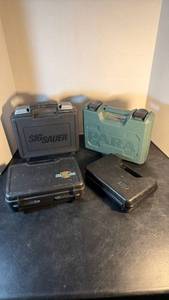 lot 1080 image: Sig Sauer and other pistol cases