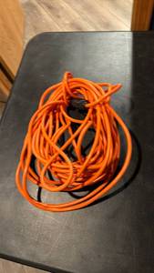 lot 1085 image: Long orange extension cord