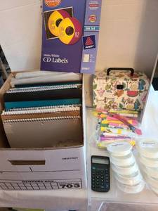 lot 1209 image: Spiral notebooks, CD labels, 3 inch cord grommets, markers, file box