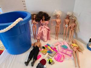 lot 1311 image: Rope handled bucket with Barbies and more.