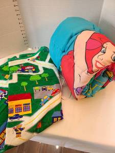 lot 1312 image: Little Mermaid Sleeping bag and a childs blanket.