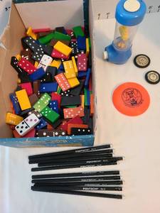 lot 1318 image: Dominoes and pencils.