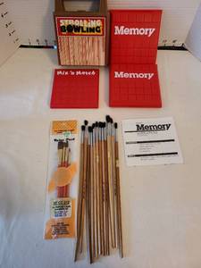 lot 1326 image: Travel games and paintbrushes.