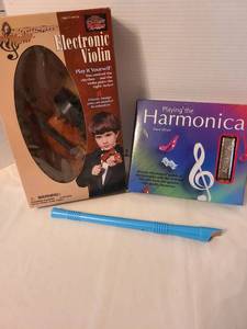 lot 1352 image: Electronic Violin, Harmonica Book & Recorder