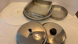lot 1413 image: Tin and other baking pans, lids and lazy Susan turn plate