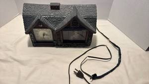lot 1455 image: Haddon Home Sweet Home Electric Clock With Moving Scene wiring needs repaired