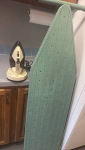 lot 1464 image: West bend iron and ironing board