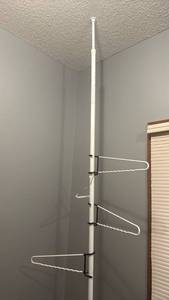 lot 1465 image: Tension rod clothes hanger approx 78 feet tall