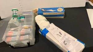 lot 1659 image: Bandaids, Vicks, shoe dryer and an air cast