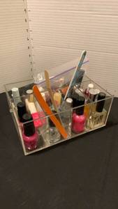 lot 1669 image: Nail polish and files in organizer