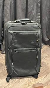lot 1748 image: Rolling Suitcase