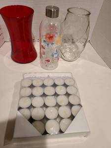 lot 1812 image: Tea lights 50 pack, glass vases, plastic water bottle