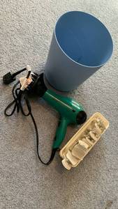 lot 2038 image: Reckon hair dryer, hair clips and trash can