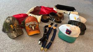 lot 2168 image: Tie Rack, Belts, Baseball Caps Mossy Oak Under Armour and more