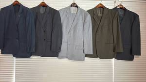 lot 2180 image: Two Piece Suit Jacket and Slacks Combos. Sizes may vary but close to 34 36 X 30 31 Jackets 42 45 Short Johnston and other Designers