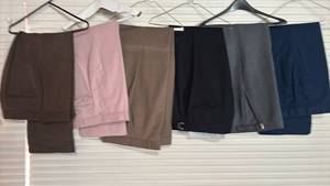 lot 2186 image: Six Pairs of Mens Dress Slacks Sizes vary from 32-36 44 to 30 32