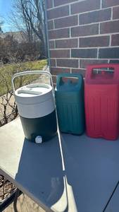 lot 3023 image: Coleman Lantern Carry Cases and Water Jug