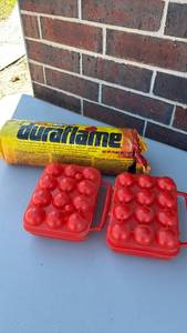 lot 3032 image: Coleman Plastic Egg Container and Duraflame Log