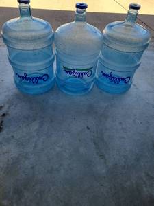 lot 3200 image: Three empty 5gal Culligan water jugs