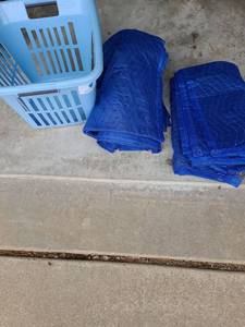 lot 3302 image: Laundry basket and 4 moving blankets.