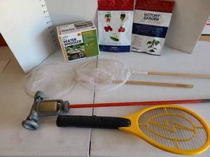 lot 3327 image: Backyard Garden Bundle - Water Wiggler, Bug Zapper, and Victory Seed Collection