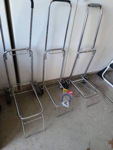 lot 3406 image: 3 luggage carts and a strap.