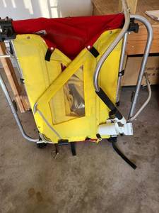 lot 3502 image: Burley bike trailer with a Champion cover that kind of fits