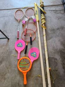 lot 3623 image: Badminton net, rackets, paddles, shuttlecocks.
