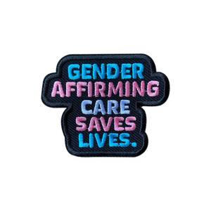 lot 58711 image: SEWOPEW Gender Affirming Care Saves Lives Hook and Loop Patch for Backpacks Hats Vest Dog Harness Bags, Size 3 Sewing Patches, Tactical Appliques for Clothes, Embroidery Patch, LGBT Pride Trans Gifts - Retail $10