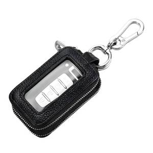 lot 3595 image: BELOMI Car Key Fob Case, Genuine Leather Remote Keychain Bag with Lanyard and Zipper Closure, Key Protection Cover for Men Women (Black) - Retail $8