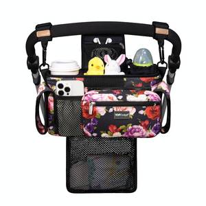 lot 3960 image: TOPDesign Universal Baby Stroller Organizer, Stroller Caddy with Detachable Mesh Bag & Heightened Insulated Cup Holders & Non-Slip Secure Hooks Accessories, Fits Most Strollers (Ranunculus) - Retail $26