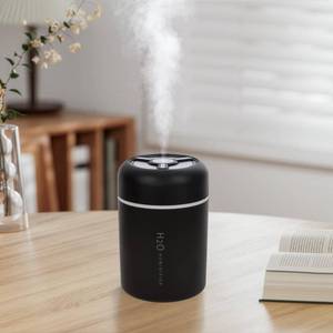 lot 4110 image: Portable Mini Humidifier, 300ml USB Cool Mist Small Humidifier with Colorful Lights. Perfect for Bedroom, Office, Plants, travel & Car (Black) - Retail $19