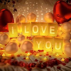 lot 5313 image: Peledic I Love You Light Up Letters, with Tea Lights Candles, Rose Petals, Pearlescent Foil Balloons - Luminary Paper Bags, Anniversary Decorations and Valentines Day Decorations for Your Loved One - Retail $23
