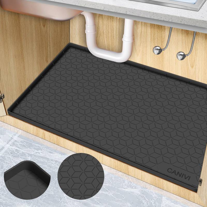 lot 3193 image: CANIVI Under Sink Mat, 28 x 22 Waterproof Silicone Under Sink Tray for Kitchen & Laundry Cabinets, Kitchen Cabinet Shelf Protector, Up to 3 Gallons Liquid, Fits 36 inch Standard Cabinet (Black)