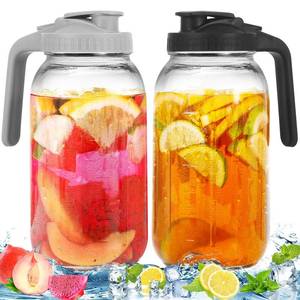 lot 6314 image: 2 Pack Glass Pitchers with Lid, 64 oz Sun Tea Pitcher, Half Gallon Mason Jar Pitcher with Wide Mouth Airtight Lid for Ice Tea, Cold Brew Coffee, Fridge Water, Milk, Juices, Leak Proof Water Jug - Retail $21