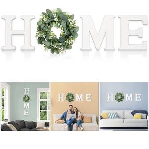 lot 6405 image: MAYICIVO Modern Wooden Home Sign with Artificial Eucalyptus Wreath, White and Beige, 13.81 inches Diameter, Wall Mount, MDF Wood, Plastic - Retail $26