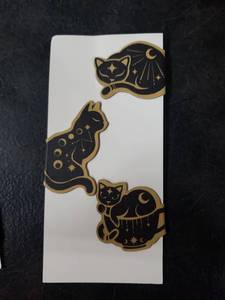 lot 6479 image: Black and Gold Celestial Cat magnetic bookmark - Retail $8