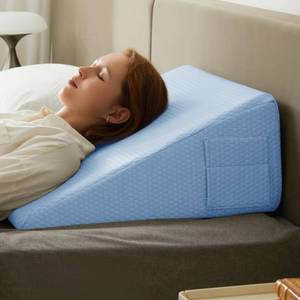 lot 6949 image: Bedluxe Wedge Pillow, 10 inch Bed Wedge Pillow for Headboard, Pillow Wedge for Acid Reflux Relief, Sleeping, After Surgery, Snoring, Gerd, Triangle Pillow Wedge - Cooling Memory Foam Top, Light Blue - Retail $36