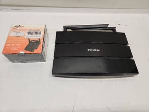 lot 28 image: Nextbox N300 Wireless WiFi Range Extender