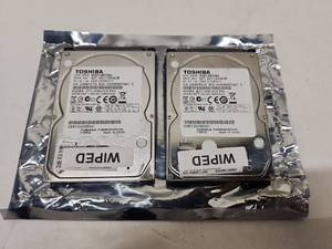 lot 63 image: Toshiba 500GB SATA Hard Drives - Pair