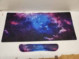 lot 102 image: Galaxy Print Mouse Pad and Wrist Rest Set