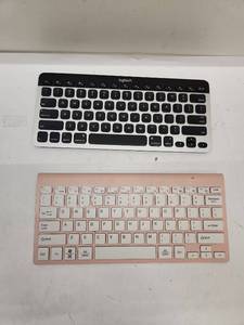 lot 139 image: Wireless Keyboard Bundle - Logitech K811 and CVL9 Rose Gold