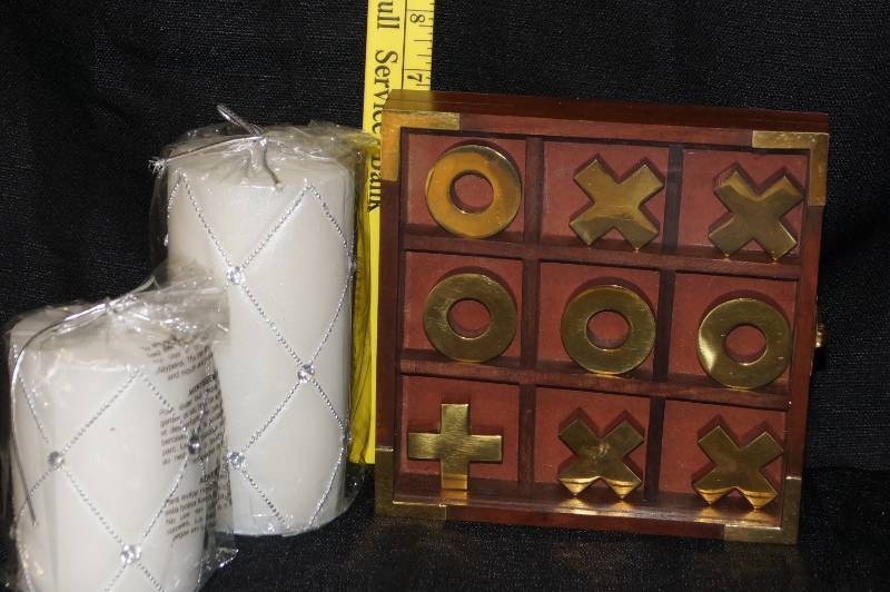 lot 270 image: Candles and Tic Tac Toe