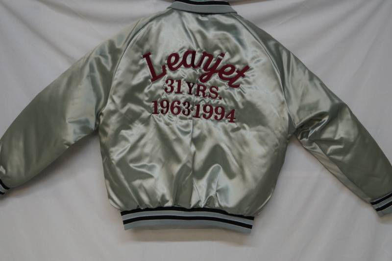 lot 307 image: Satin Jacket- Learjet Anniversary
