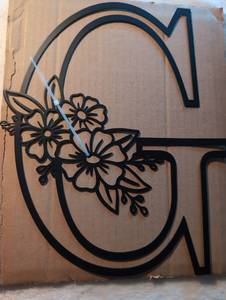 lot 2413 image: Black Metal Floral Letter G Wall Art