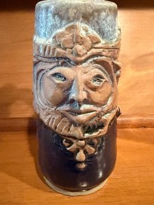 lot 16 image: Pottery Mug w Face, Signed Flat Earth