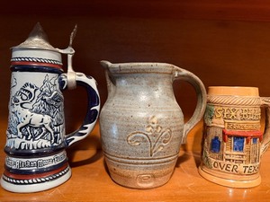 lot 18 image: Avon and Souvenir Steins, Pottery Pitcher