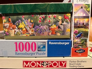 lot 25 image: Puzzles and Monopoly