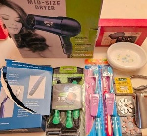 lot 80 image: Bathroom Cabinet Contents,Hair Dryer, Toothbrushes, Razors and More