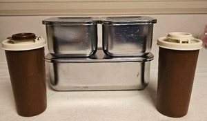 lot 128 image: Revere Ware Steel Storage and Tupperware SP Shakers
